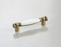 Меблева ручка Giusti РГ 624 M09.00.00.D1G старе золото з білою керамікою