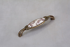 Меблева ручка Giusti РГ 513 M78.01.H2.D1G старе золото з керамікою